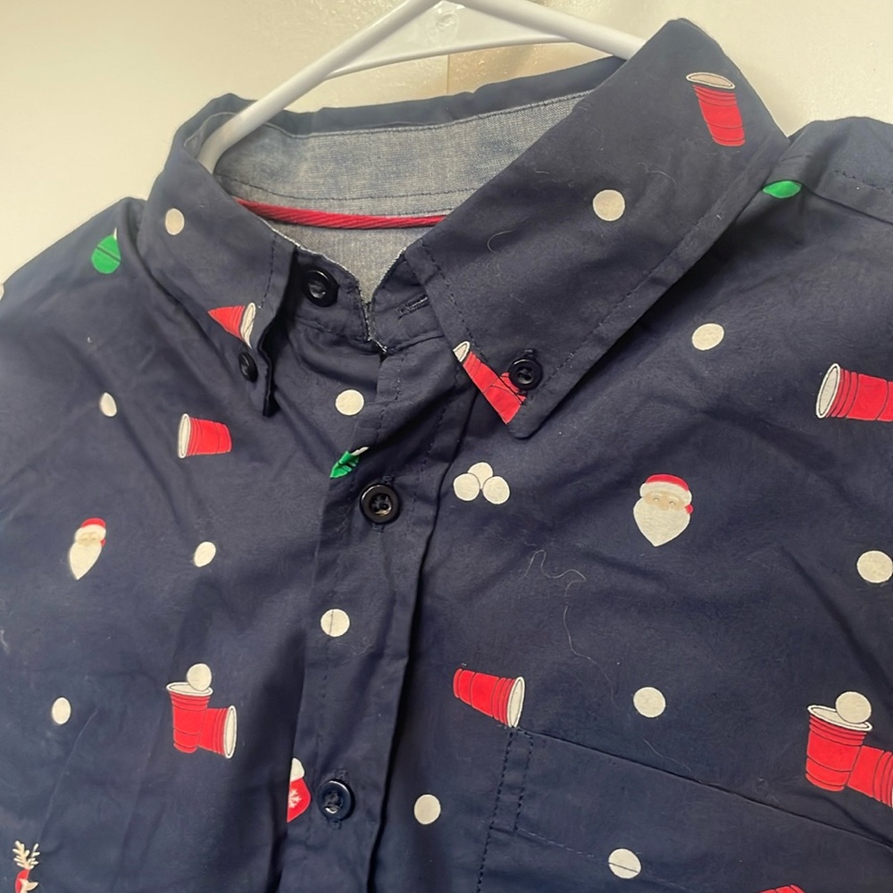 New holiday shirt by 88 brand. Red solo cups and Santas.  Ugly Christmas sweater